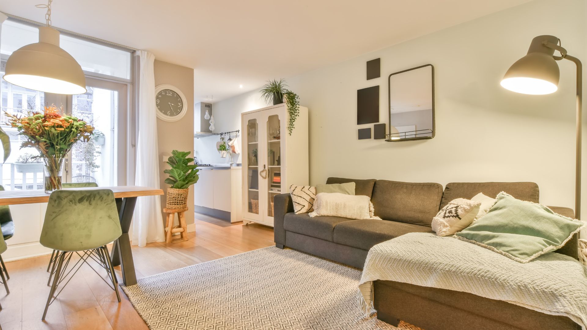 A living room filled with furniture and a table